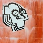 Abstract face in black and white on red background